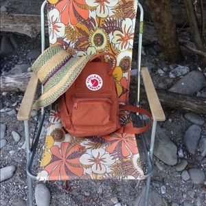 Rust colored Fjallraven Kanken mini backpack